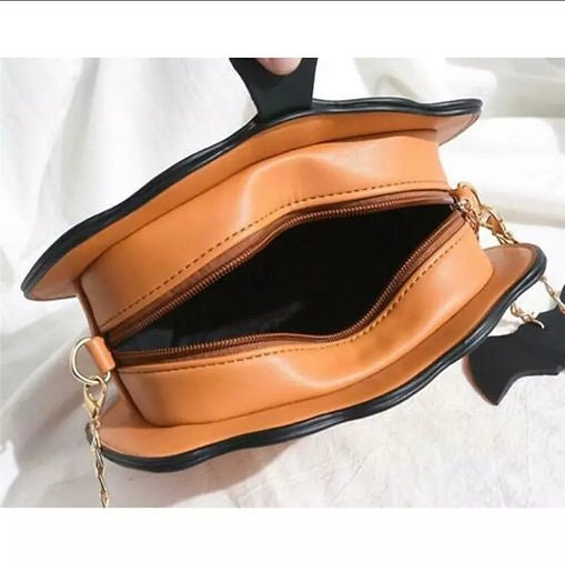 Pumpkin clutch bag
